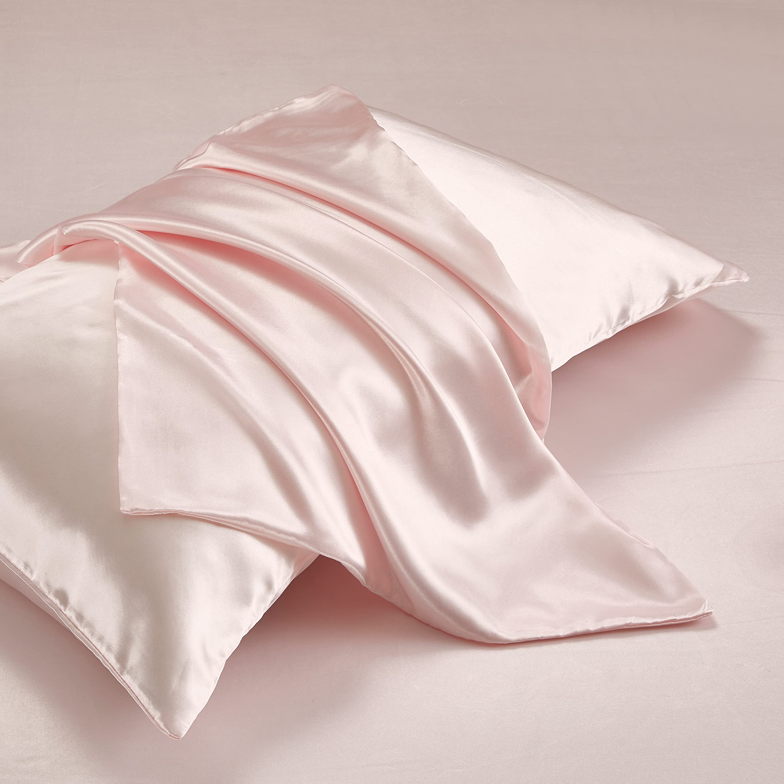 HommxJF fabric close-up highlighting satin weave and soft-to-touch benefit
