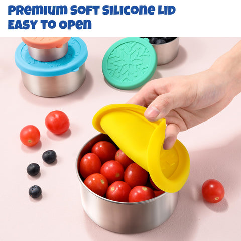 Homotte 2oz dip container beside a lunchbox for kid-friendly snack packing