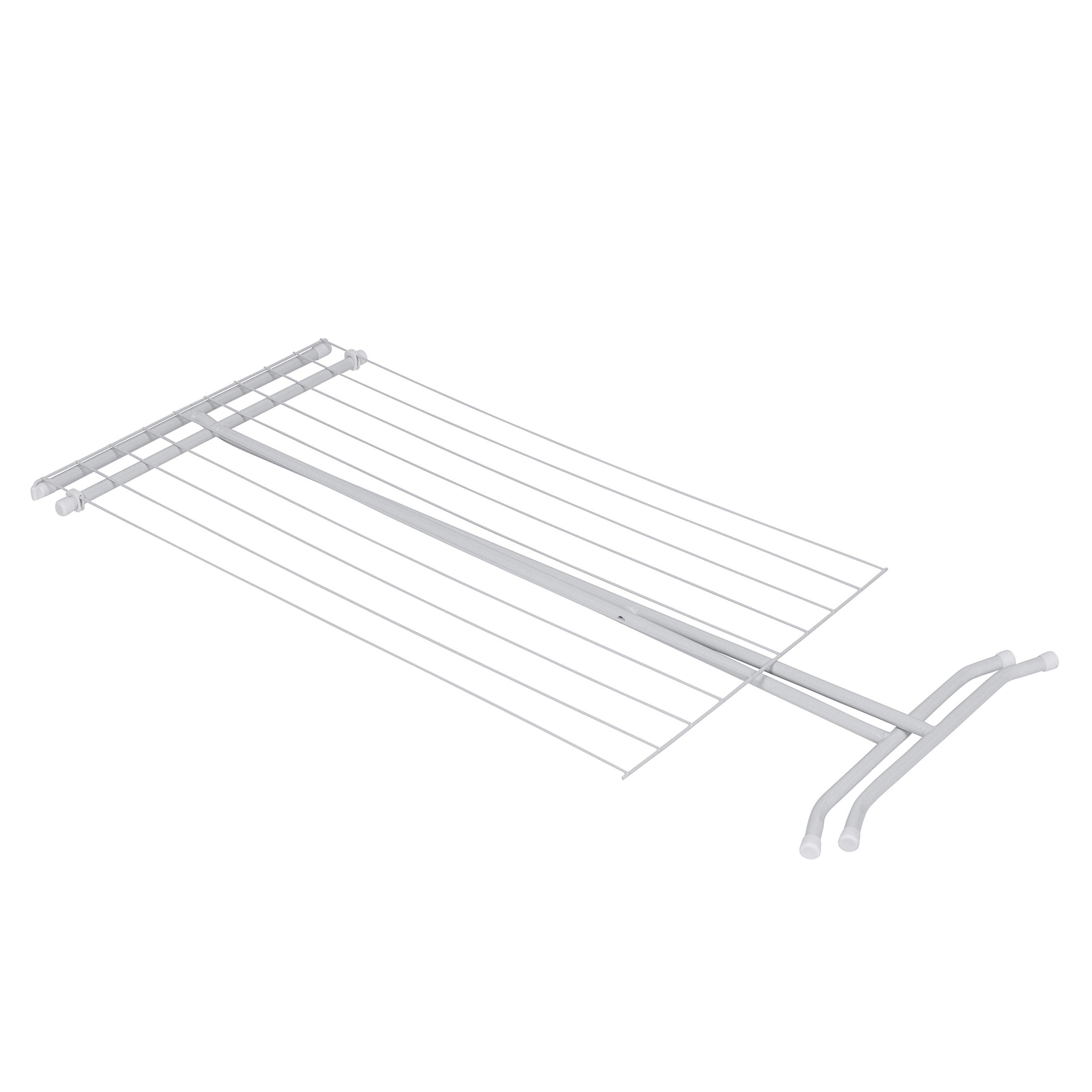 Honey-Can-Do rack beside a chair showing compact size and user-friendly scale