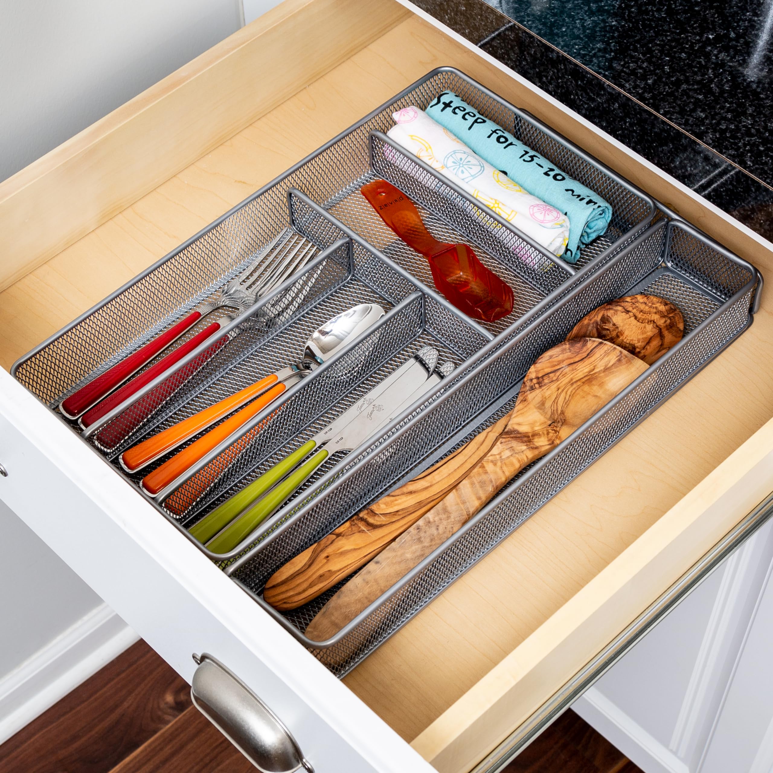 Honey-Can-Do organizer expanded demonstrating adjustable width for various drawers