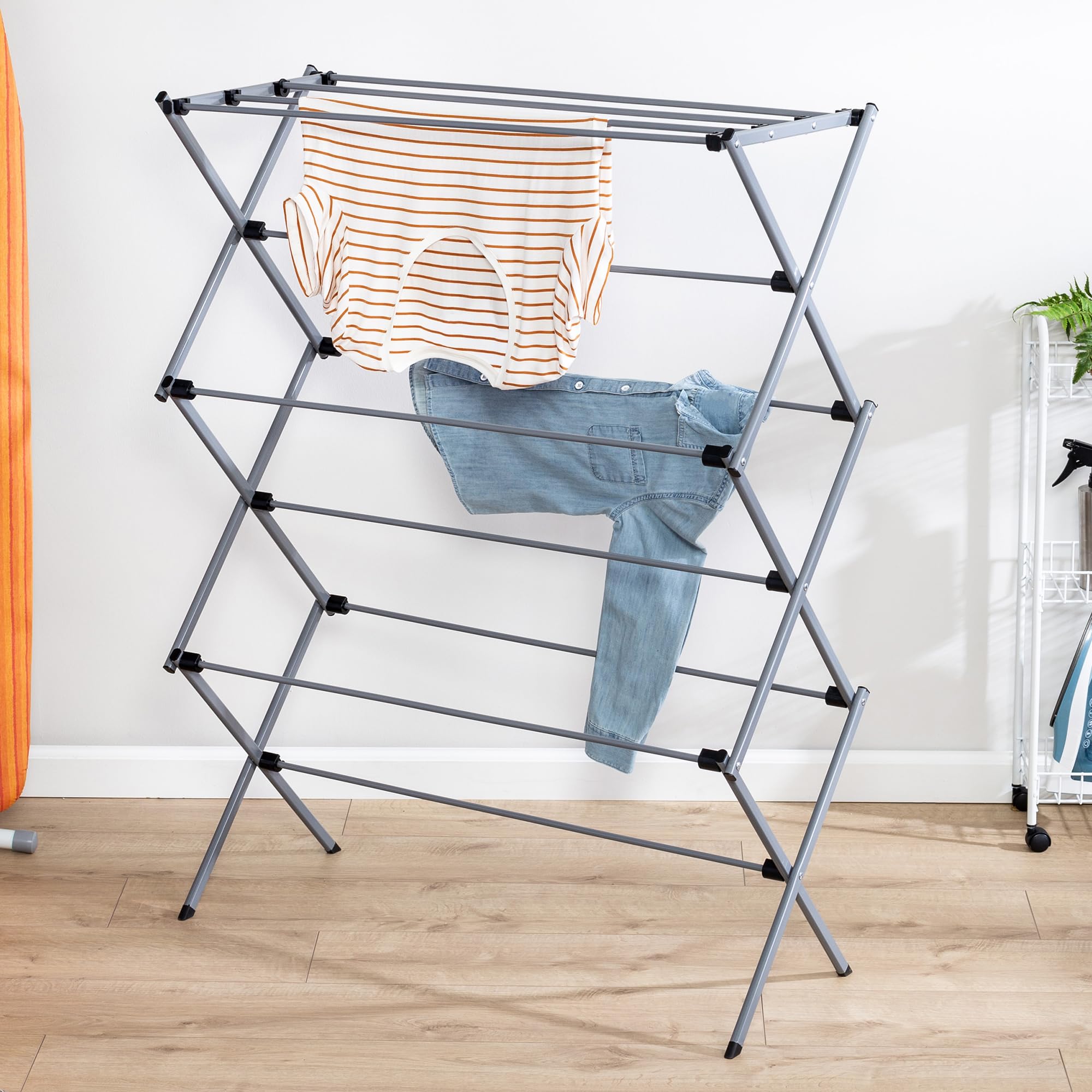 Honey-Can-Do rack loaded with towels demonstrating generous drying capacity