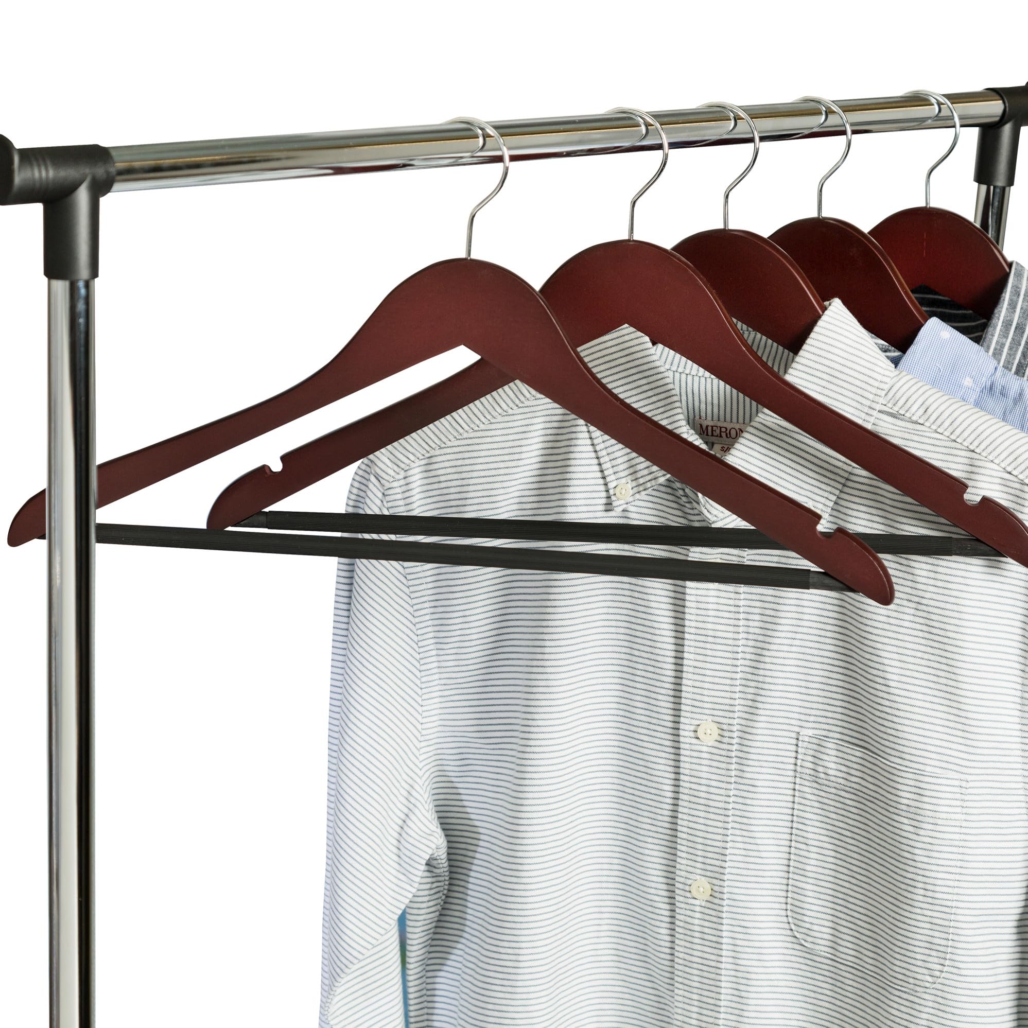 Honey-Can-Do hanger next to hand for size comparison showing slim-profile storage