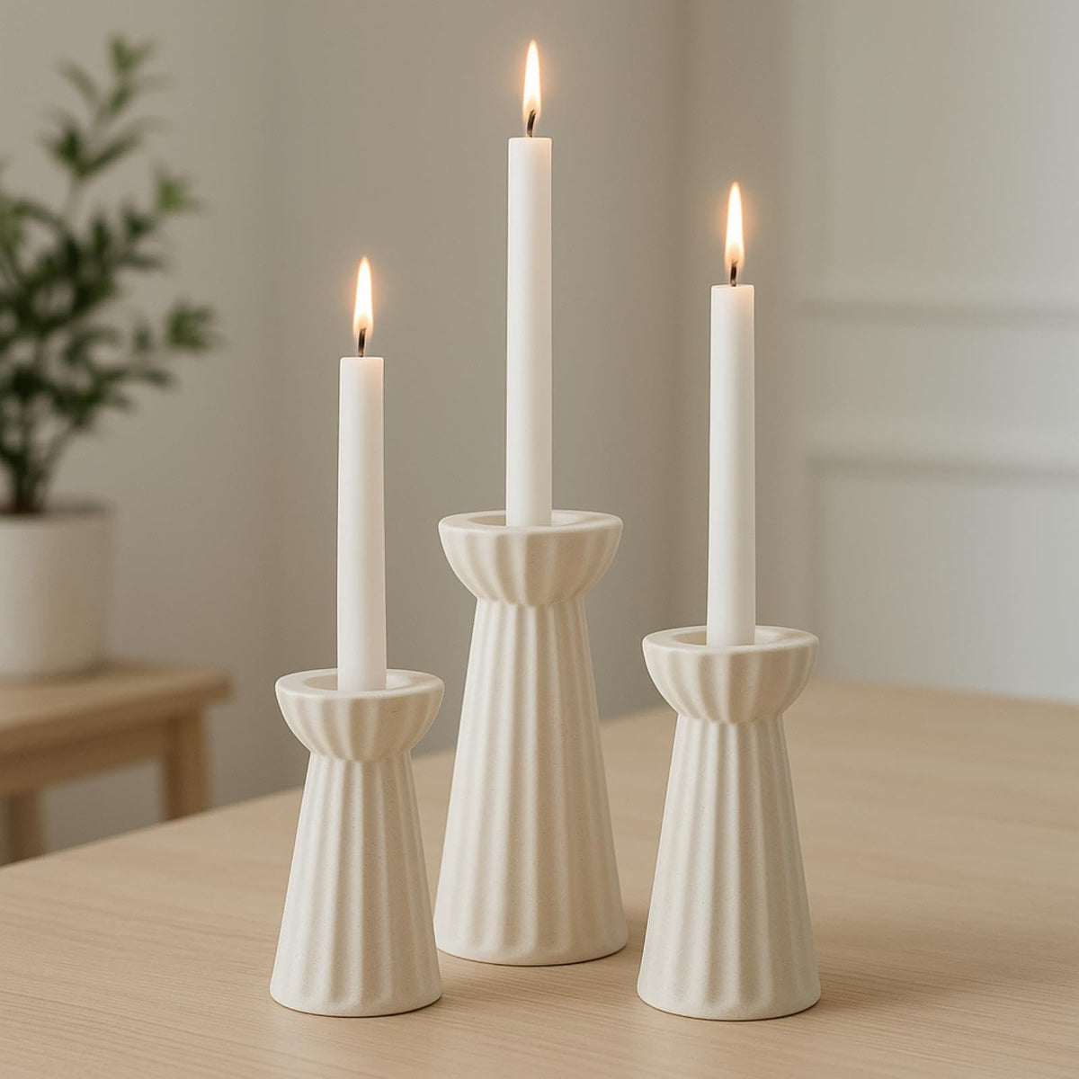 Honeydak front view of three cream ceramic candle holders showing elegant display benefit