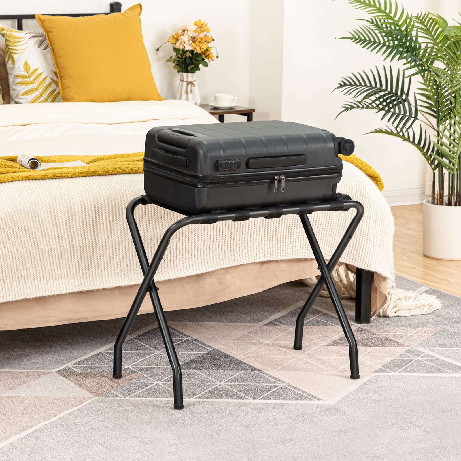 HOOBRO luggage rack with suitcase in use for easier packing and access