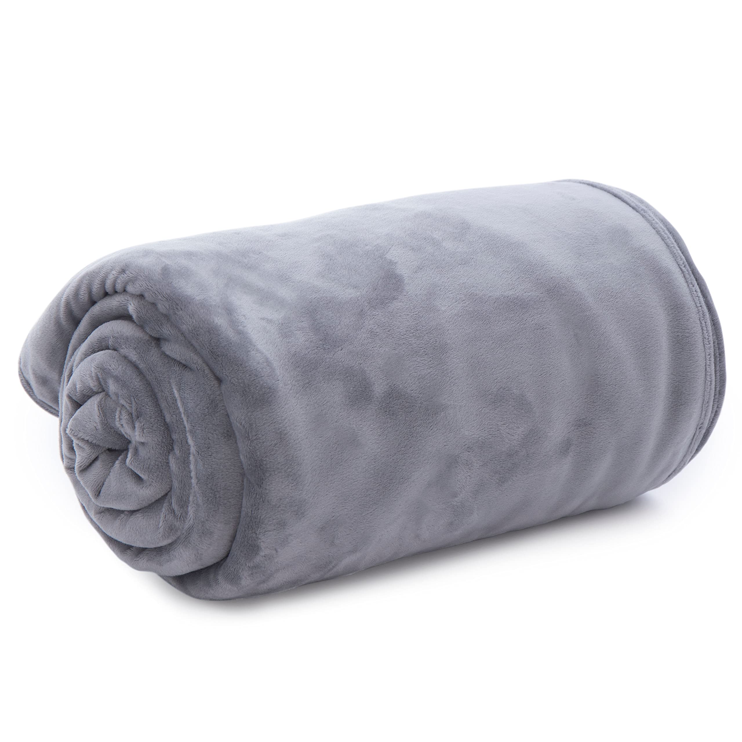 hooga folded blanket beside ruler illustrating 60x80-inch size and scale