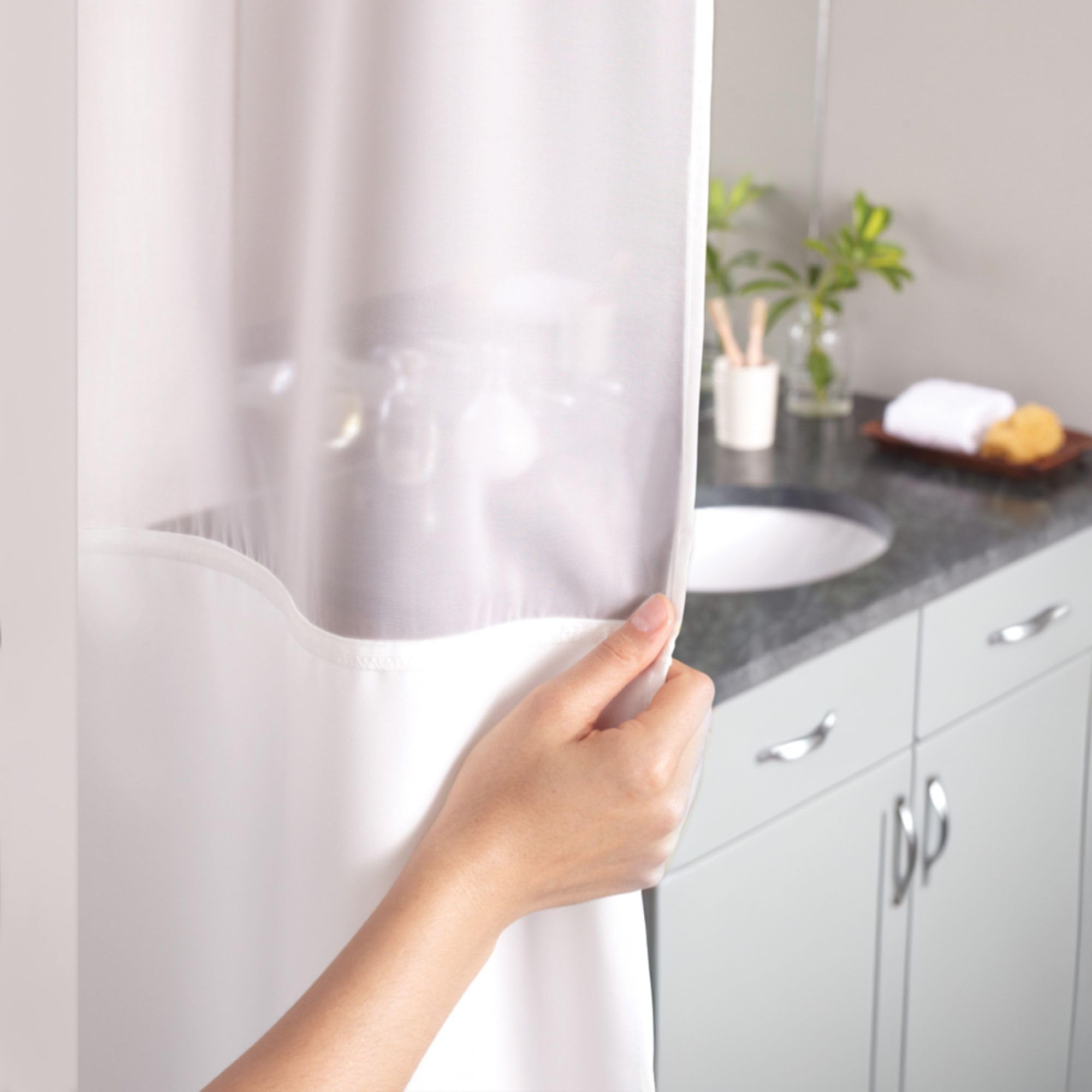 Hookless sheer top window detail admitting light while maintaining privacy benefit