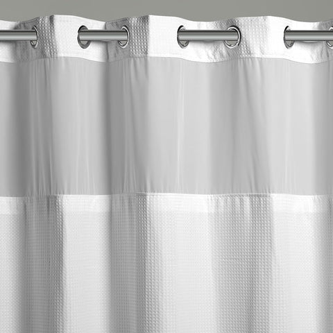 Hookless waffle fabric close-up highlighting texture and quick-dry performance benefit