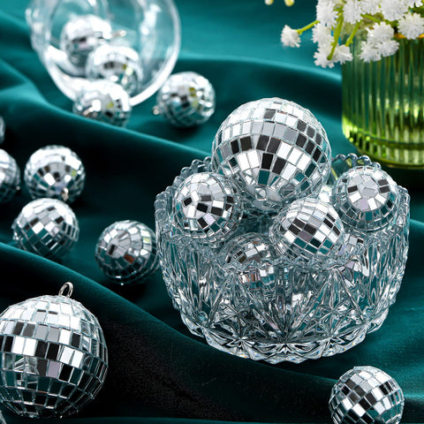 Hoolerry assorted disco balls used as tabletop decorations adding festive shimmer