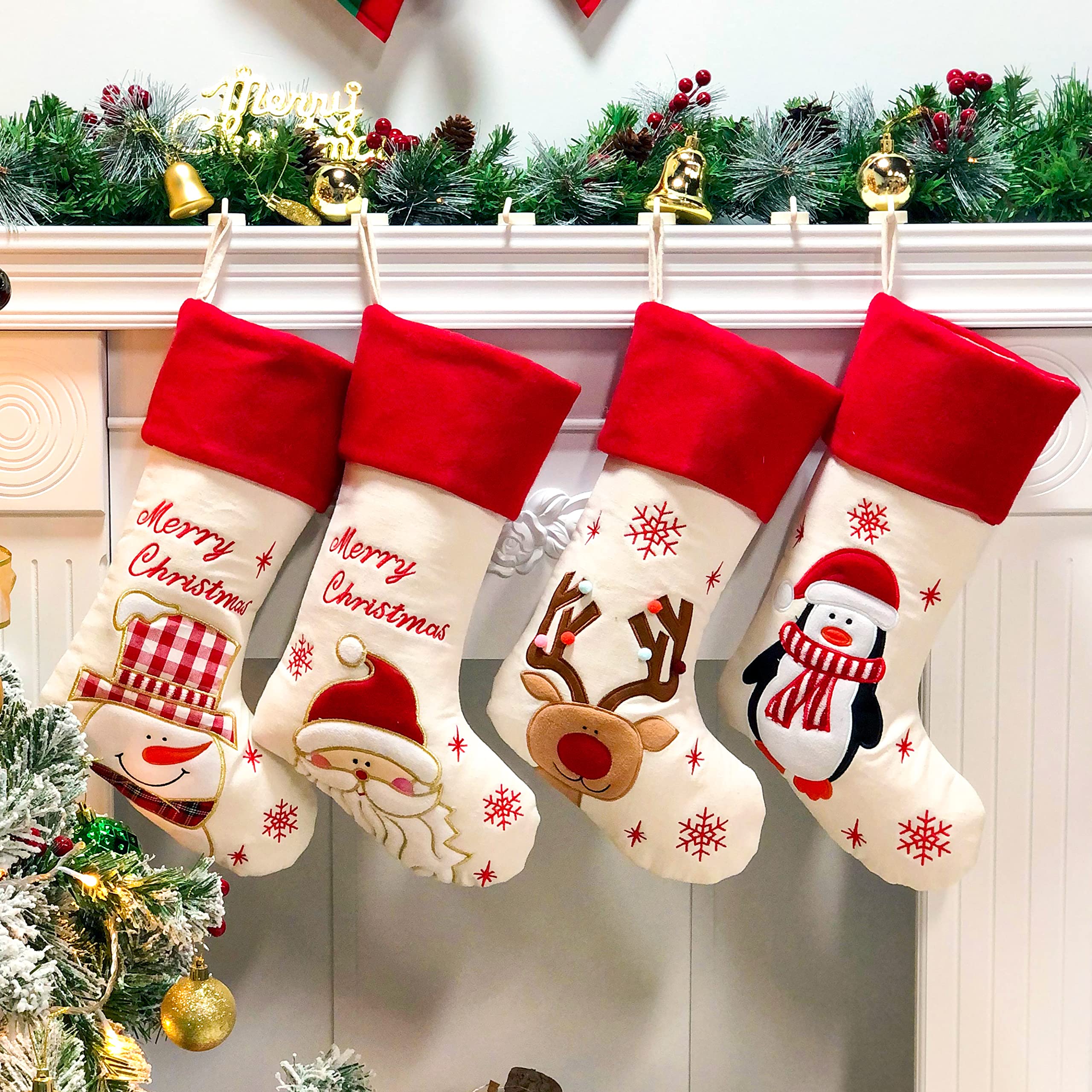 Hopearl front view of four stockings showing matching festive designs and coordinated decor