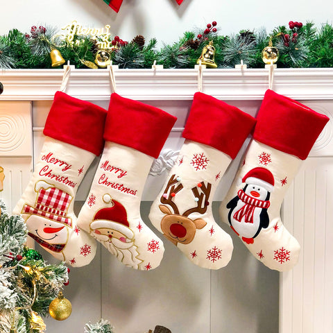 Hopearl front view of four stockings showing matching festive designs and coordinated decor
