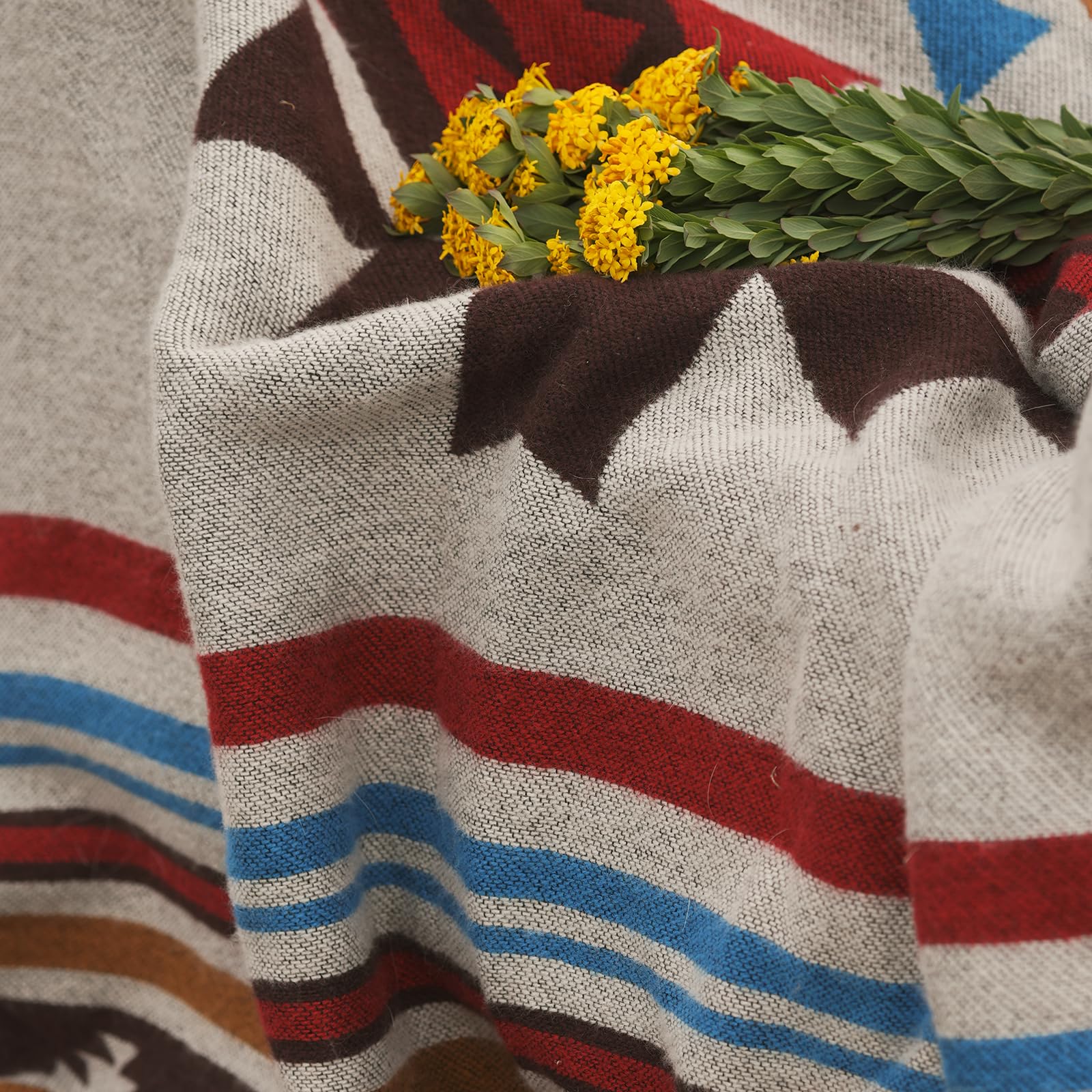 HORIMOTE HOME blanket folded for storage demonstrating travel-ready portability