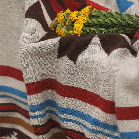 HORIMOTE HOME blanket folded for storage demonstrating travel-ready portability