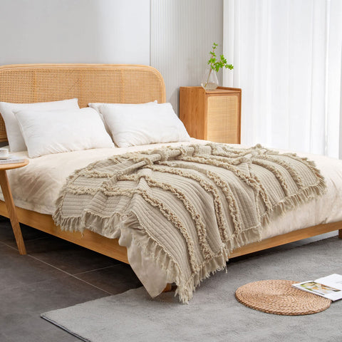 HORIMOTE HOME draped over bed end creating layered bedroom warmth