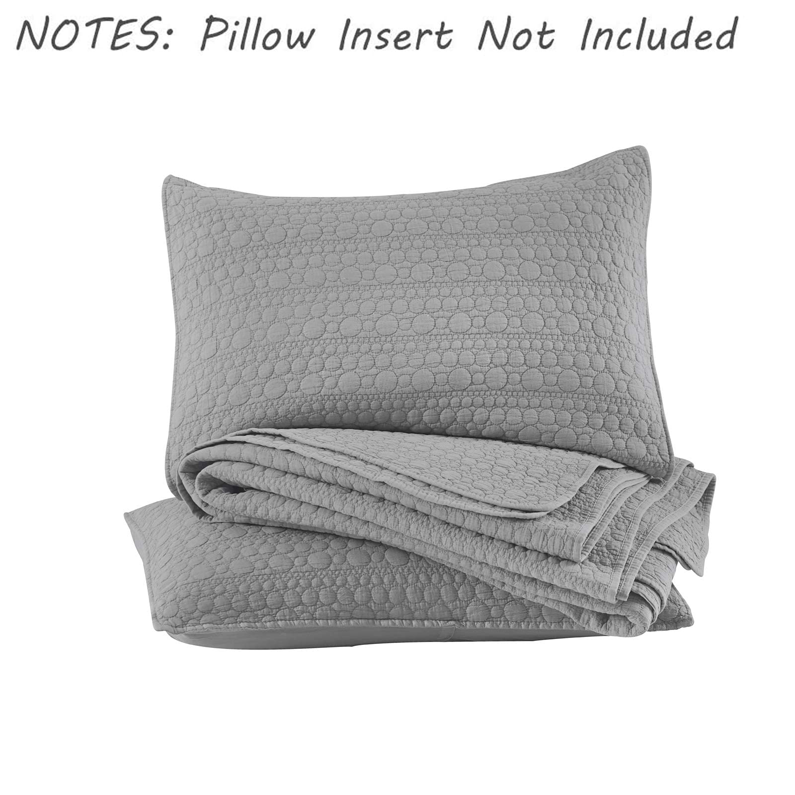 HORIMOTE HOME styled bedroom with quilt showing versatile grey décor pairing