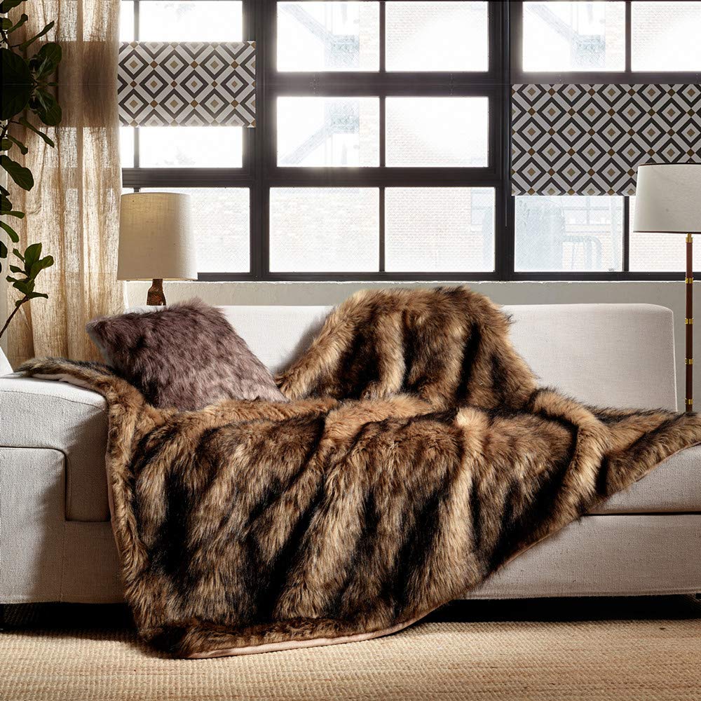 HORIMOTE HOME blanket draped over sofa adding cozy style and room warmth