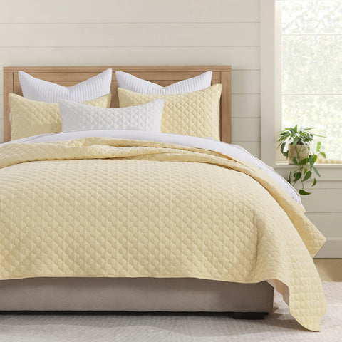 HORIMOTE HOME front view of light yellow quilt set showing full bedspread coverage and modern look