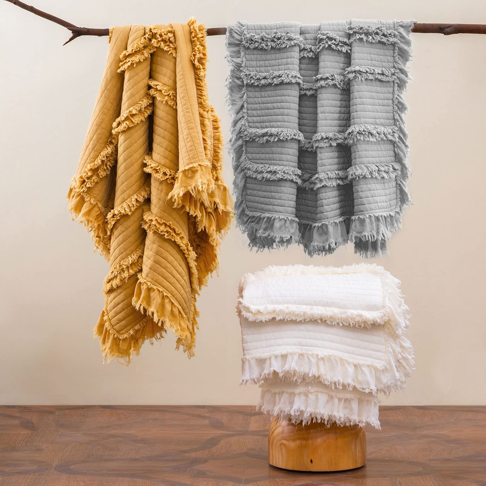HORIMOTE HOME folded throw with hand for scale and easy storage