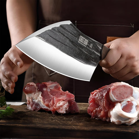 HOSHANHO cleaver slicing meat showing bone-cutting strength and controlled chopping benefit