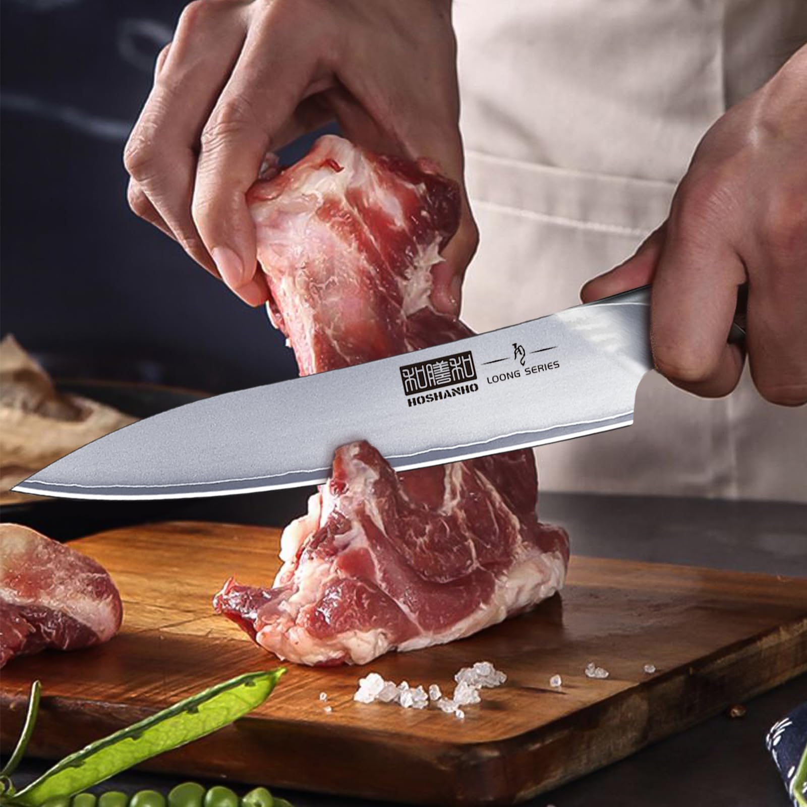 HOSHANHO slicing tomato cleanly to demonstrate sharpness and effortless cuts