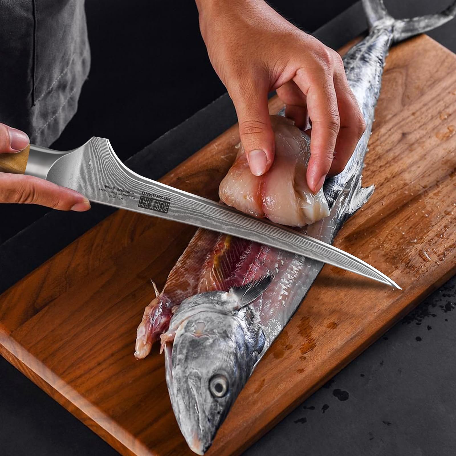 HOSHANHO blade beside whole fish for scale and accurate filleting benefit