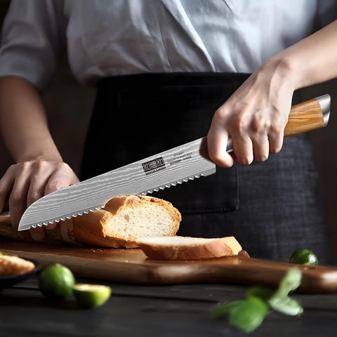 HOSHANHO knife beside a baguette illustrating blade length and scale