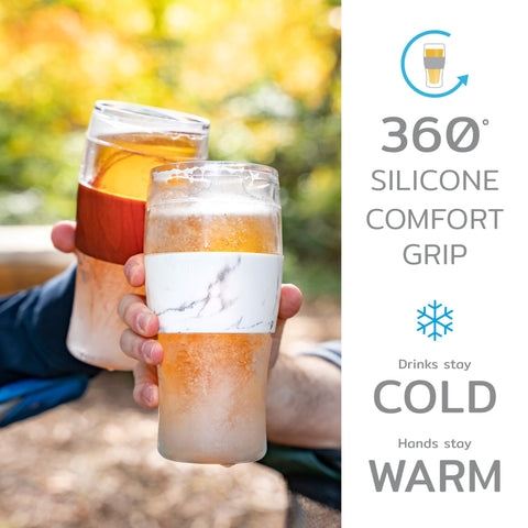 Host pouring frothy beer into frozen cup keeping drink refreshingly cold