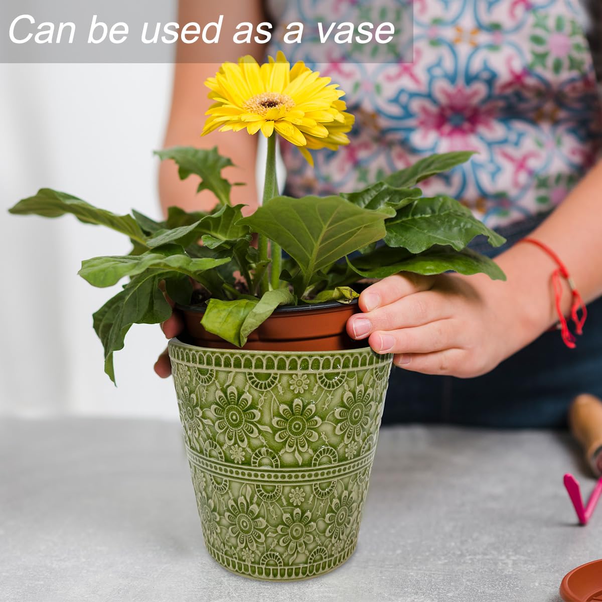 HOSVOT candle held in hand showing size and practical portability for trips