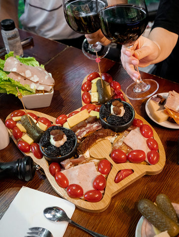 HOUSE PARTY 2K20 board beside everyday items to show 11-12 inch size for portion planning