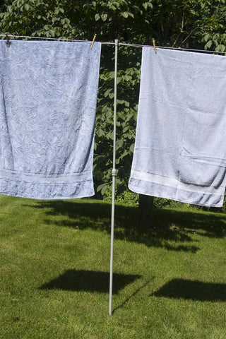 Household Essentials clothesline prop front view showing sturdy steel and stable stake for secure drying