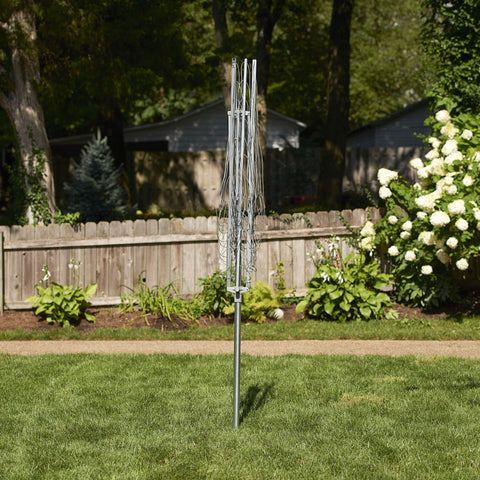 Household Essentials umbrella dryer set in a backyard showing tidy, energy-saving drying