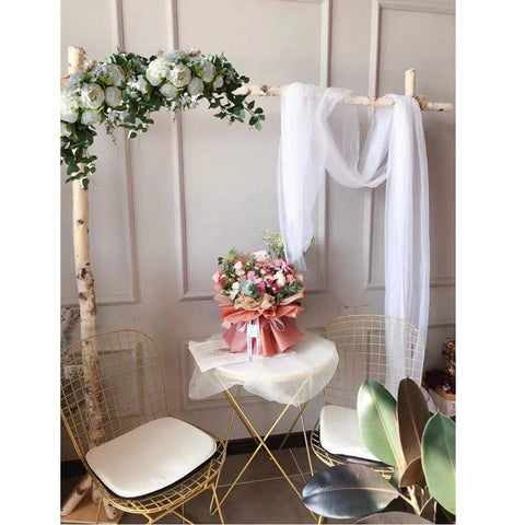H&S BRIDAL styled as a table centerpiece showing versatility and event-ready appearance
