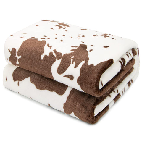 HSEEC cow blanket neatly folded in packaging for easy storage and gifting