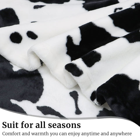 HSEEC cow blanket draped on sofa for warm living-room styling