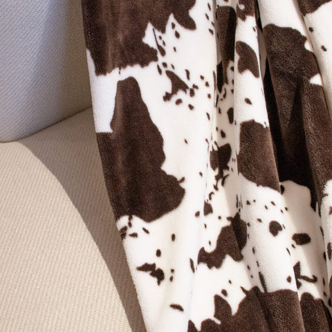 HSEEC cow print blanket close-up of fleece texture for ultra-soft comfort