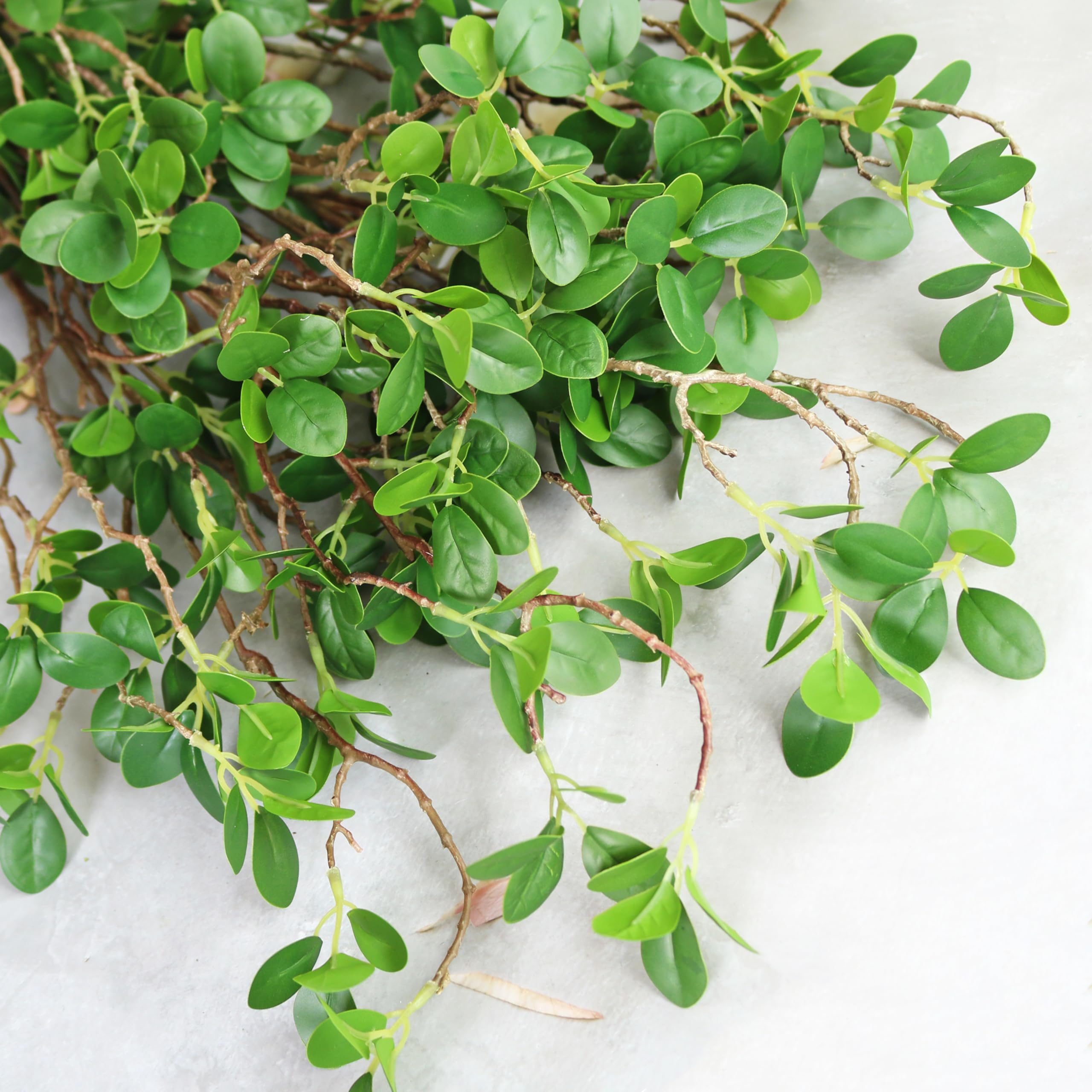 Htmeing entryway vignette with branches adding farmhouse charm