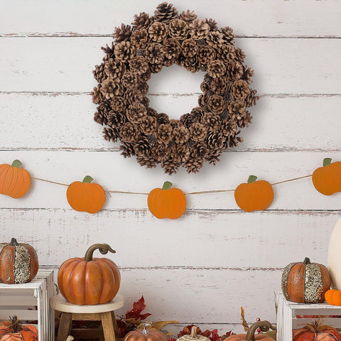 Huashen wreath on porch with pumpkins showing versatile seasonal styling