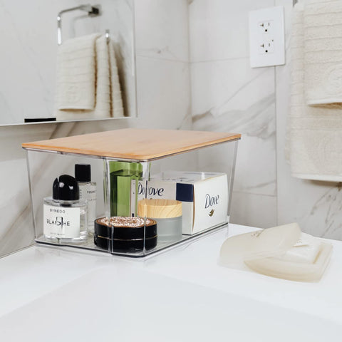 Hudgan bins inside a medicine cabinet keeping toiletries visible and accessible benefit