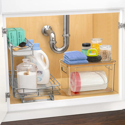 Hudgan on kitchen counter with folded laundry showing tidy staging convenience