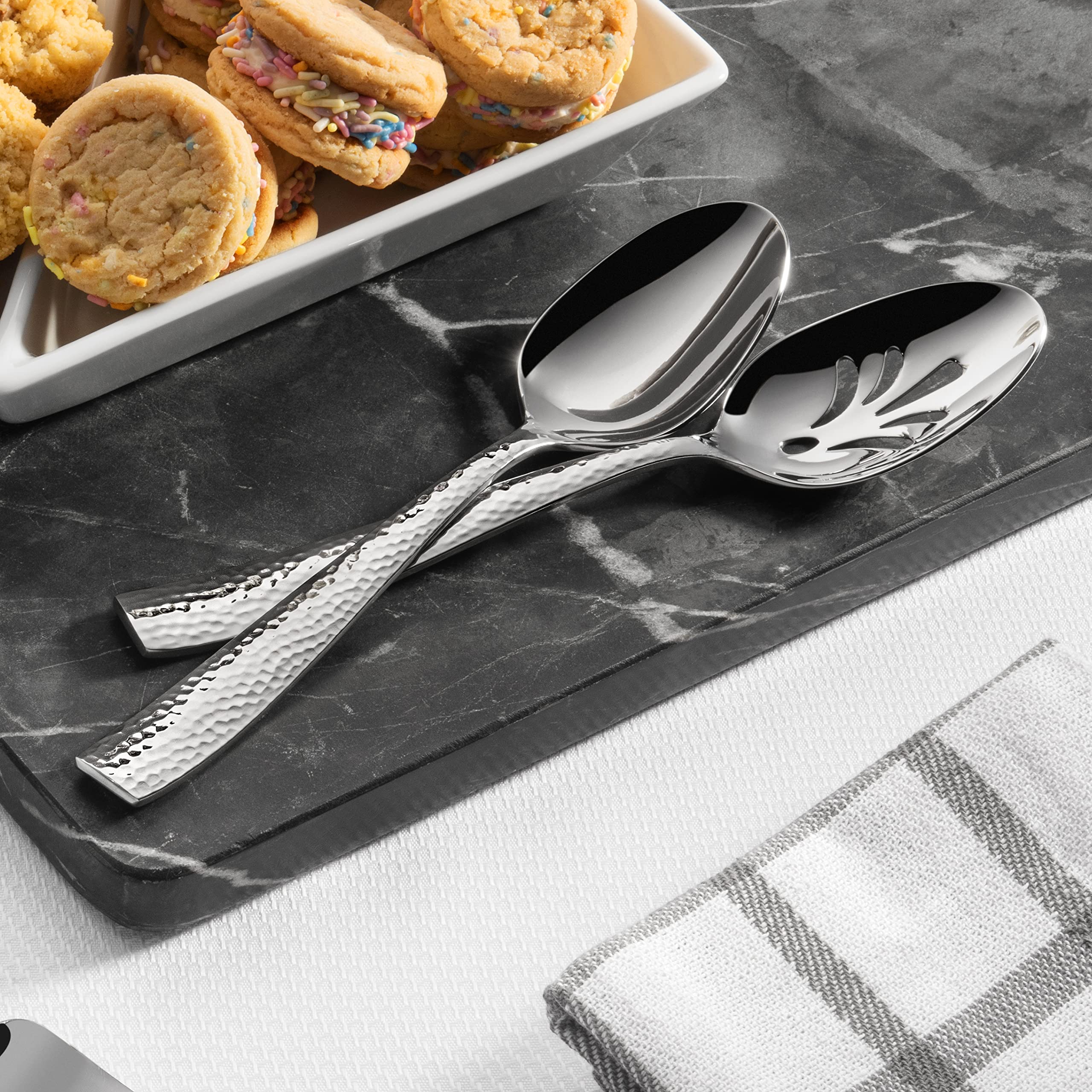 Hudson Essentials cake knife and server cutting cake for neat presentation
