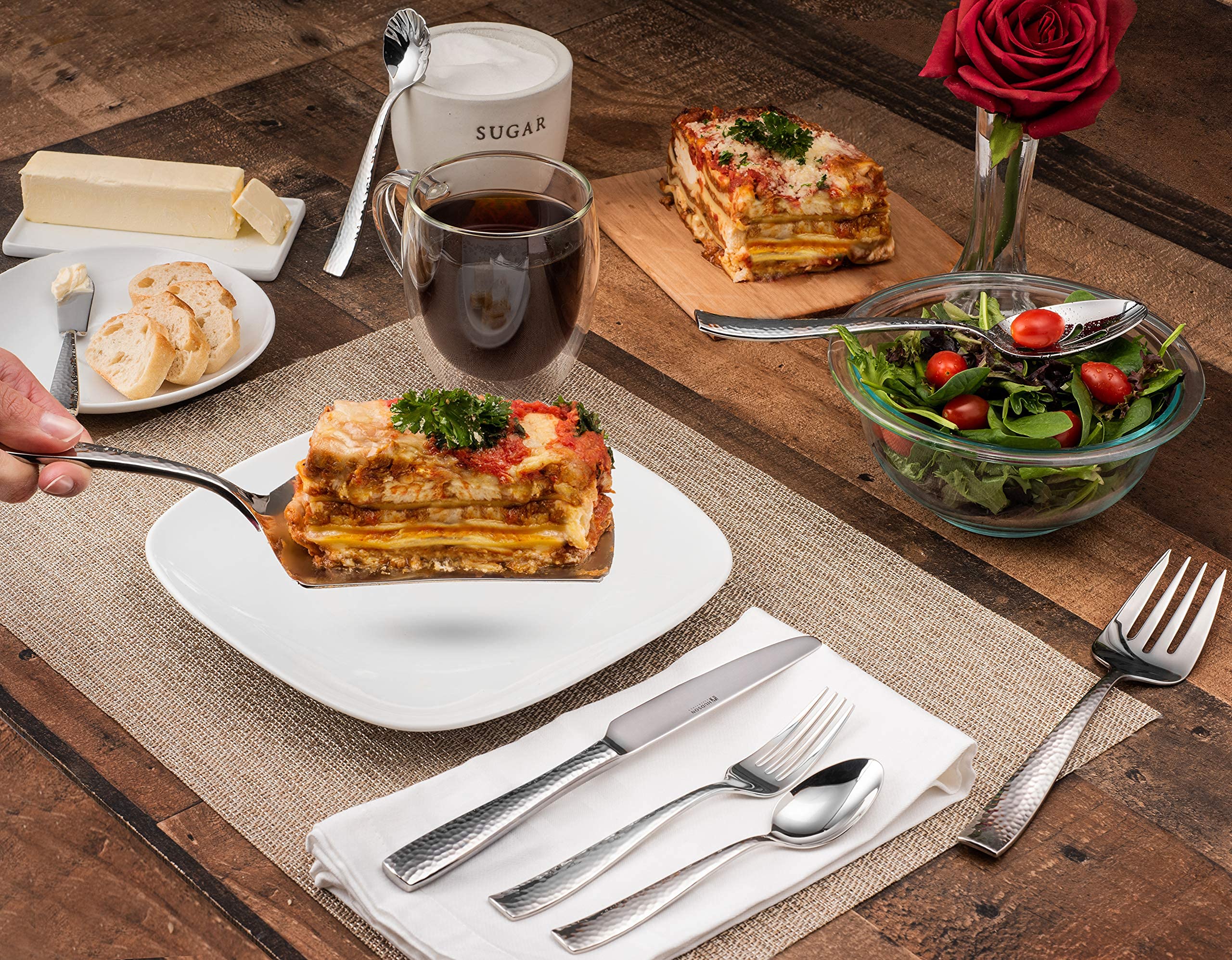 Hudson Essentials forks arranged on table demonstrating balanced weight and refined profile