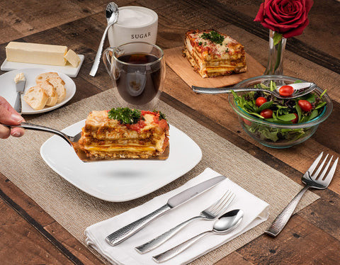 Hudson Essentials forks arranged on table demonstrating balanced weight and refined profile