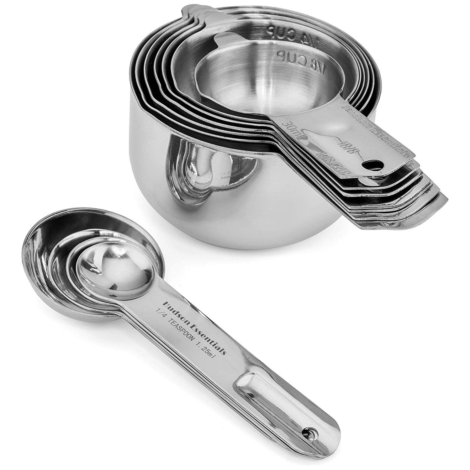Hudson Essentials cups beside a regular spoon for scale to show compact size