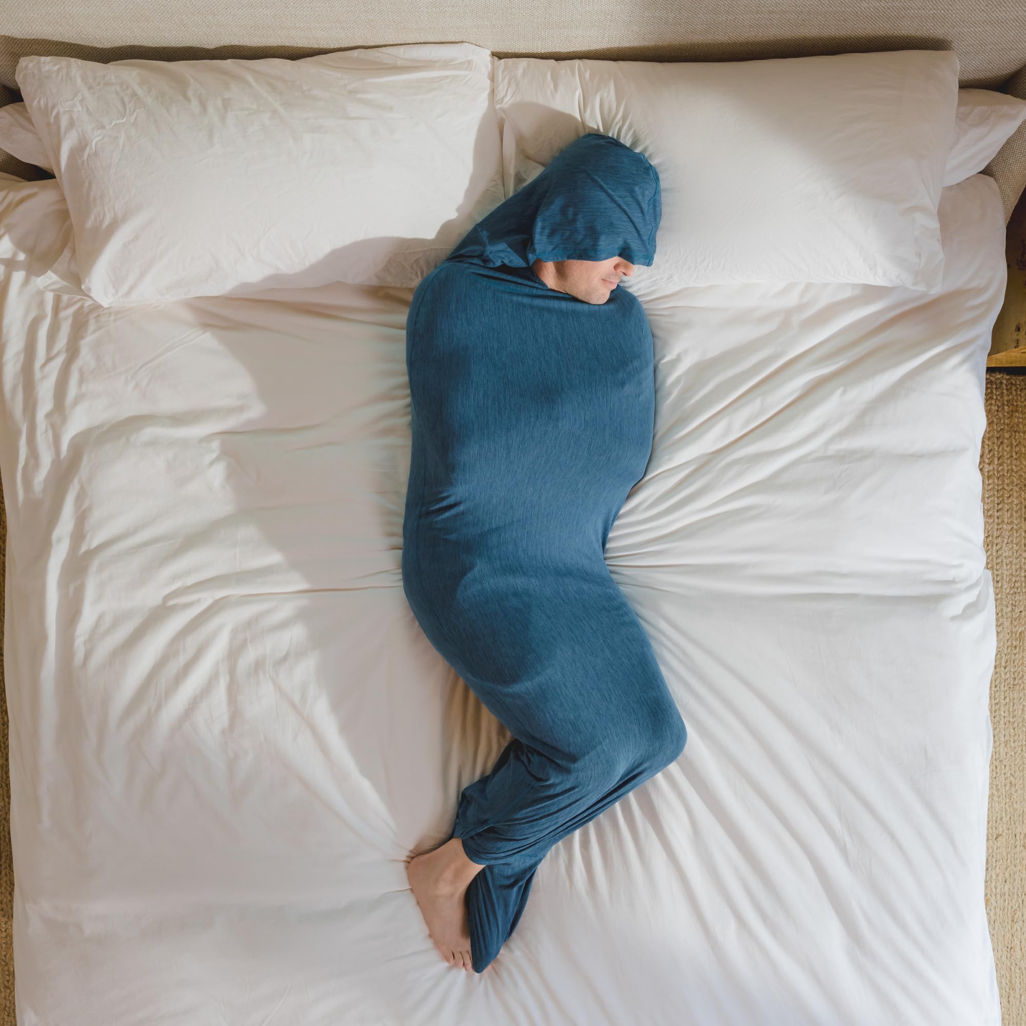 Hug Sleep front view of turquoise sleep pod showing full wearable blanket comfort and coverage