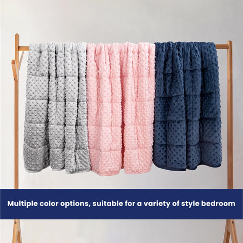 Huloo Sleep draped over a couch with person reading showing cozy relaxation and everyday use benefit