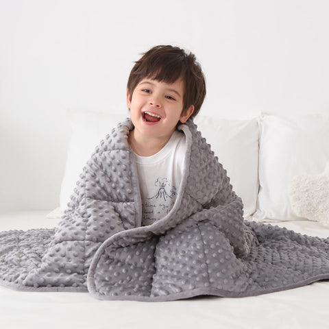 Huloo Sleep front view of gray kids weighted blanket showing plush surface and size benefit