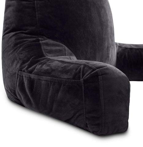 Husband Pillow styled in black in a bedroom to show finished look