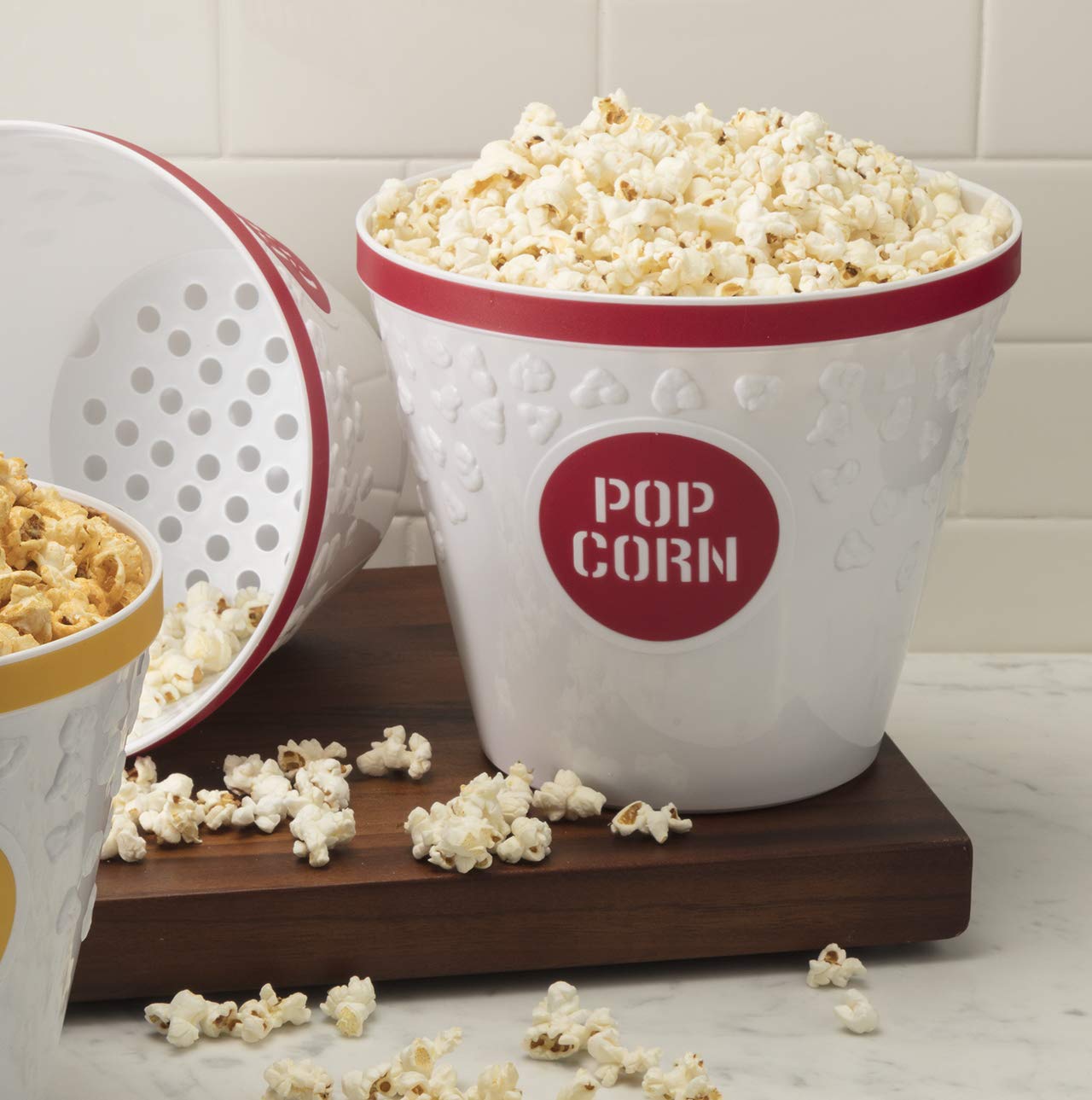 Hutzler buckets in use during movie night showing large capacity and family fun