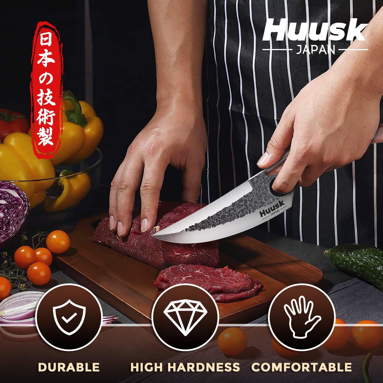 Huusk blade closeup highlighting blackened finish and precise V-edge