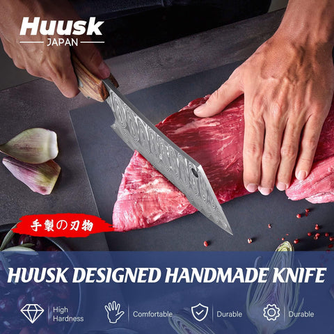 Huusk cleaver blade close-up highlighting hardened ATS-34 edge for long-lasting sharpness