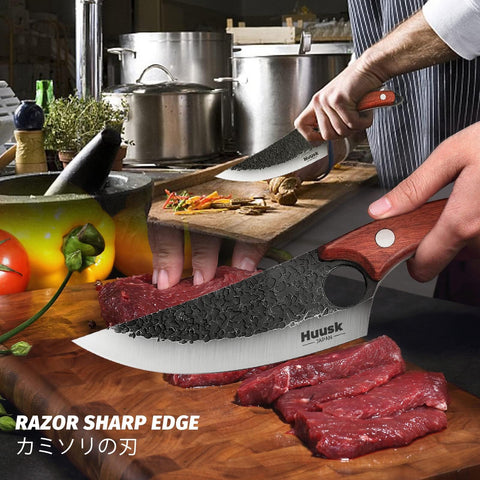 Huusk wood handle close-up, demonstrates ergonomic grip and secure finger hole